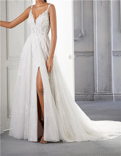 A-line wedding dress, in net over lace, sleeveless bodice v-neckline